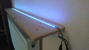 Shelf with LEDs, now on the wall